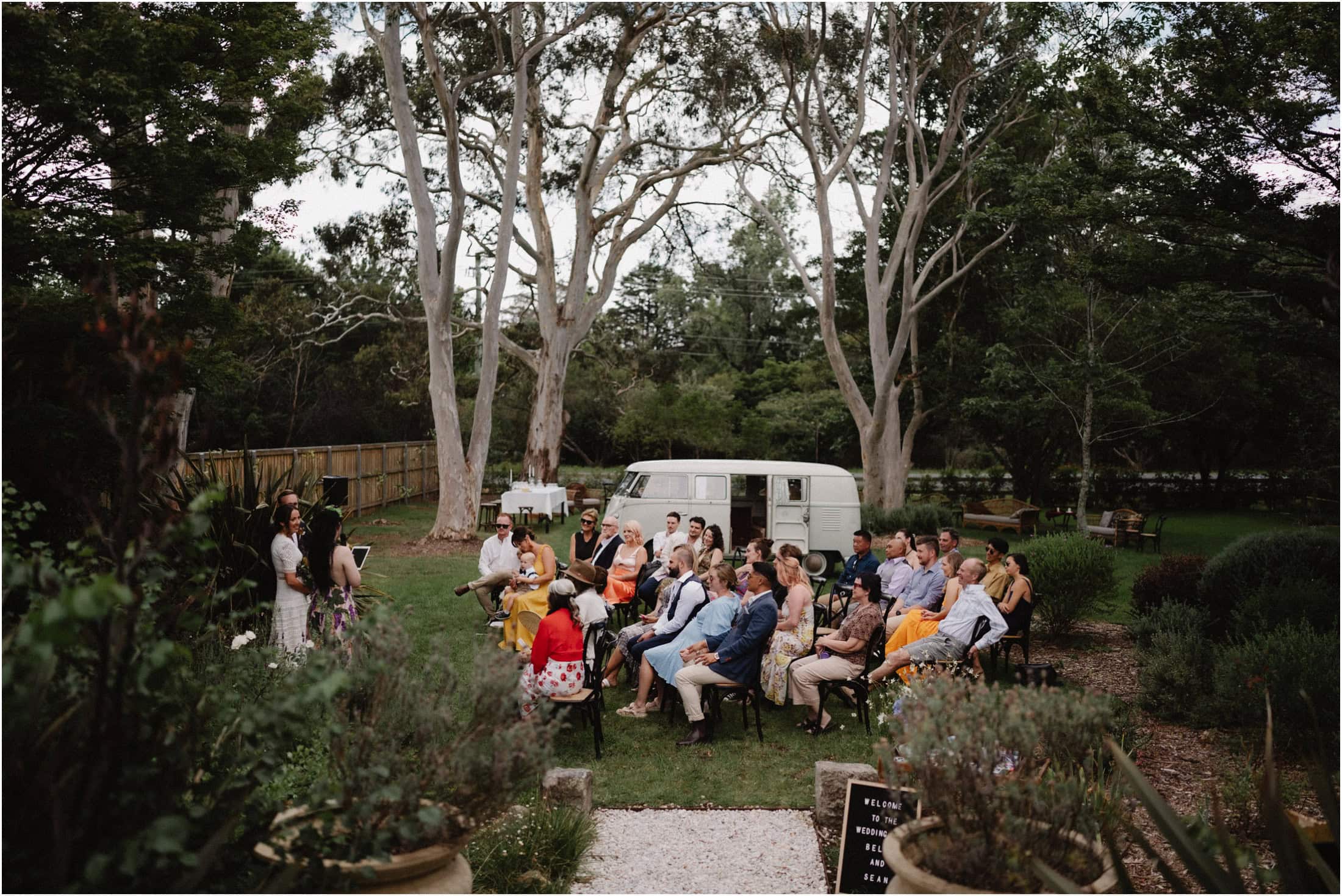 A Highball House Bundanoon wedding ceremony in full swing, with a nice old Kombi in the background