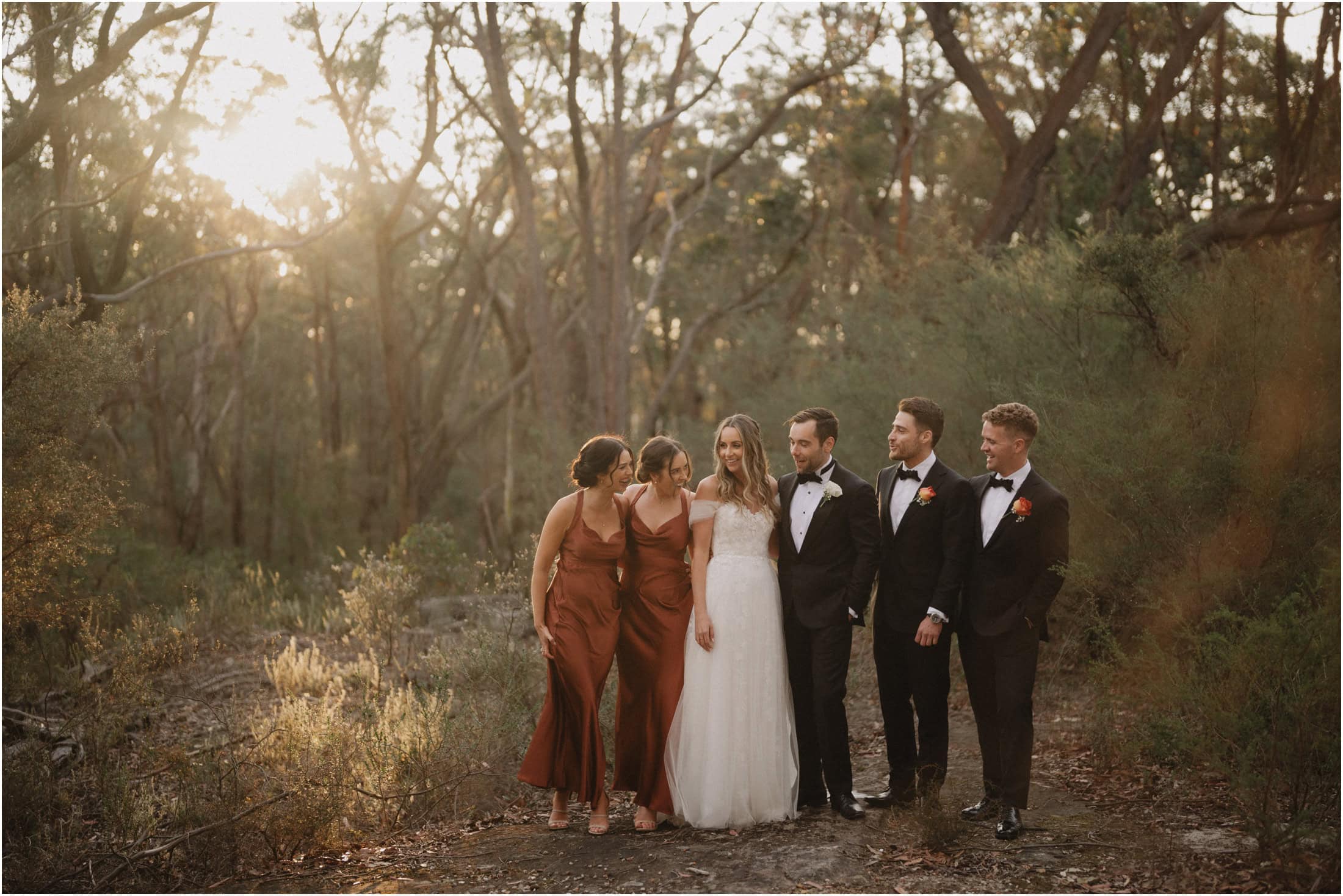 A bridal party stand in beautiful bushland during a Growwild Wildflower Farm wedding