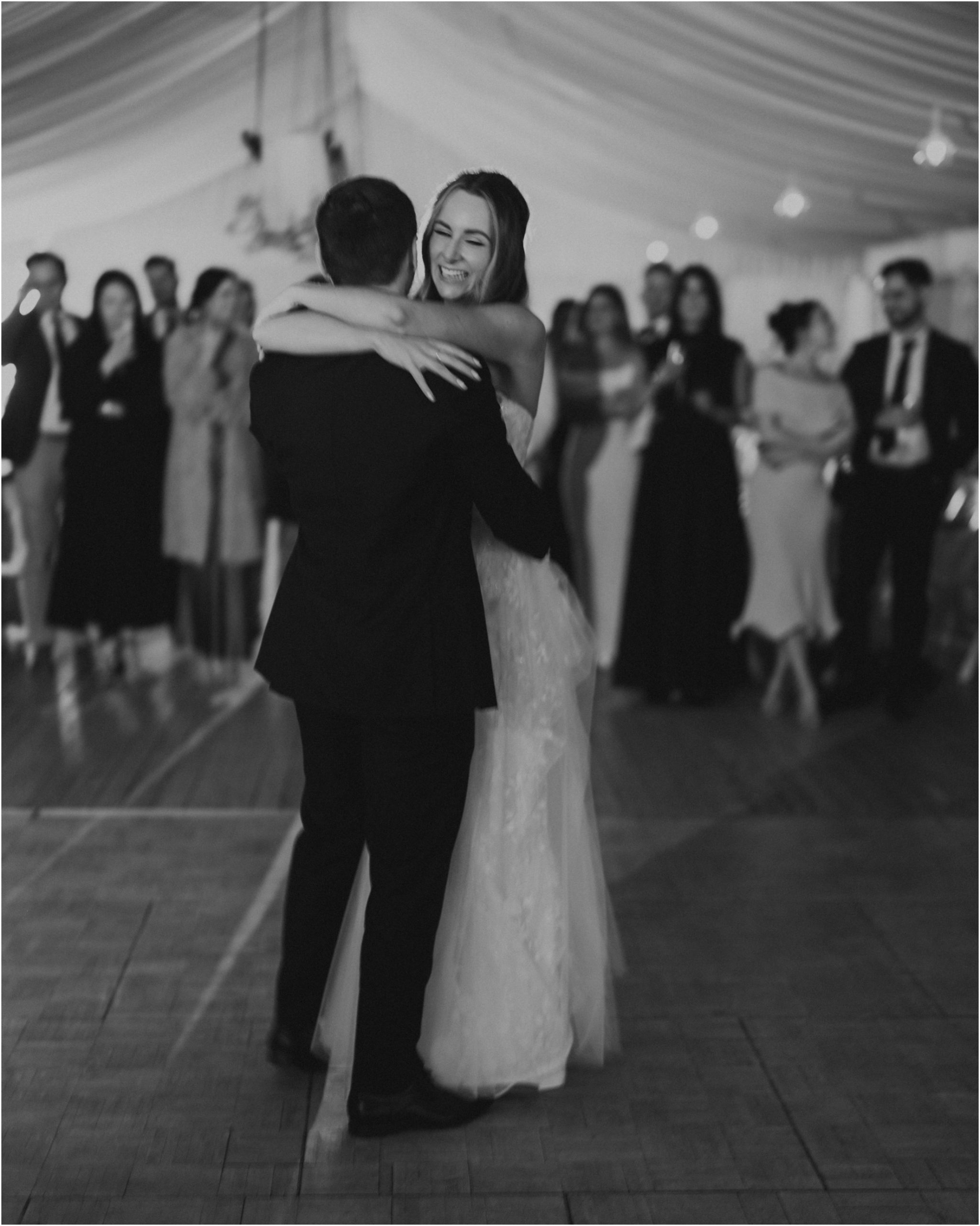 Casey and Matthew during their first dance at their beautiful Growwild Wildflower Farm wedding